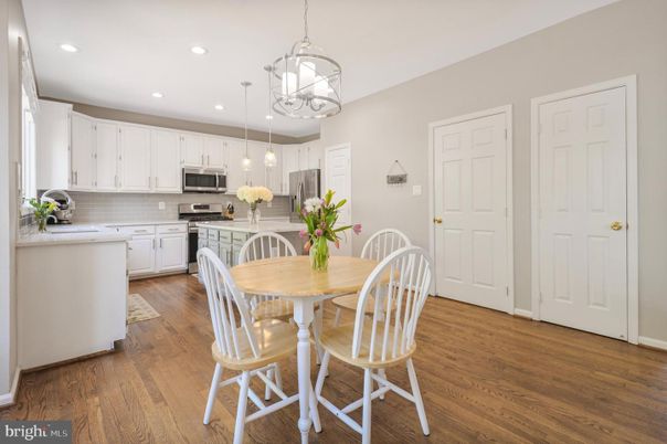 Dining room, Interior, Kitchen, Pendant Lights, Recessed Lighting, Stainless Steel Appliances, Wood Texture Flooring