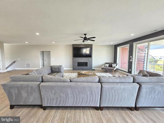 Fireplace, Interior, Living room, Recessed Lighting, Wood Texture Flooring