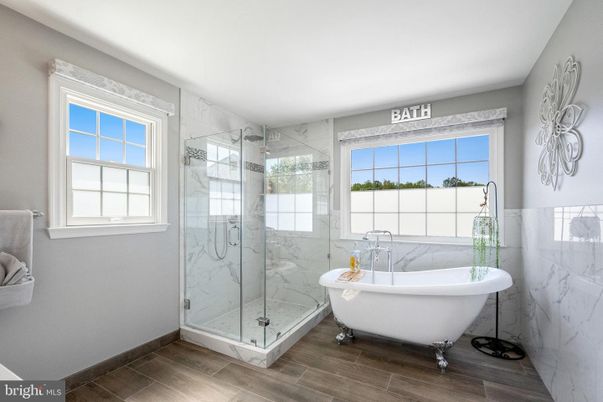 Bathroom, Free Standing Baths, Glass Shower, Interior, Marble Walls, Wood Texture Flooring