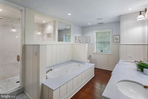 Bathroom, Dual Sink Vanities, Interior, Recessed Lighting, Wood Texture Flooring