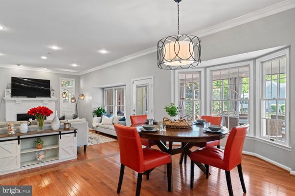Dining room, Fireplace, Interior, Living room, Pendant Lights, Recessed Lighting, Wood Texture Flooring