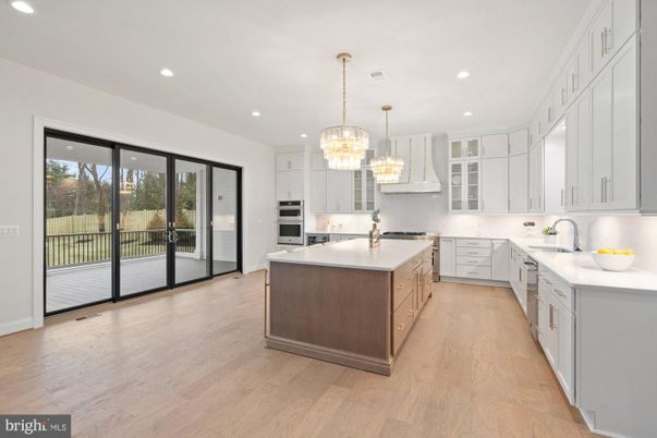 Chandelier, Interior, Kitchen, Pendant Lights, Recessed Lighting, Stainless Steel Appliances, Wood Texture Flooring