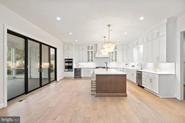 Chandelier, Interior, Kitchen, Pendant Lights, Recessed Lighting, Stainless Steel Appliances, Wood Texture Flooring