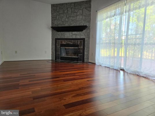 Empty room, Fireplace, Interior, Stone Walls, Wood Texture Flooring