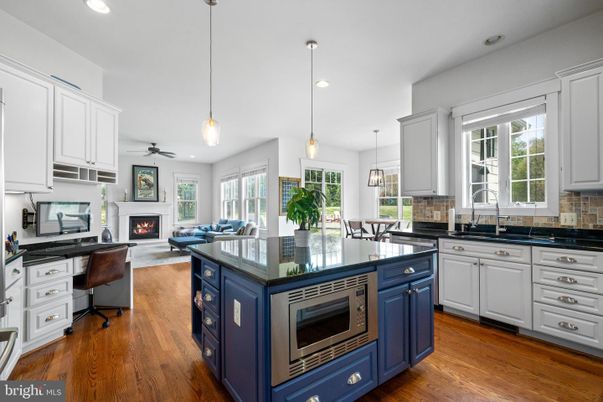 Dining room, Fireplace, Interior, Kitchen, Living room, Pendant Lights, Recessed Lighting, Wood Texture Flooring
