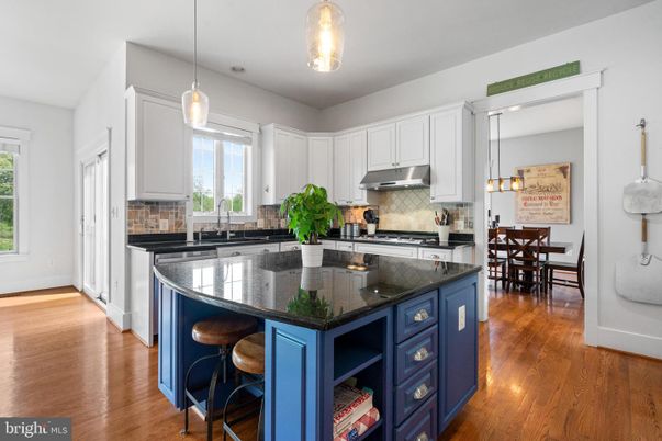 Dining room, Interior, Kitchen, Pendant Lights, Stainless Steel Appliances, Wood Texture Flooring