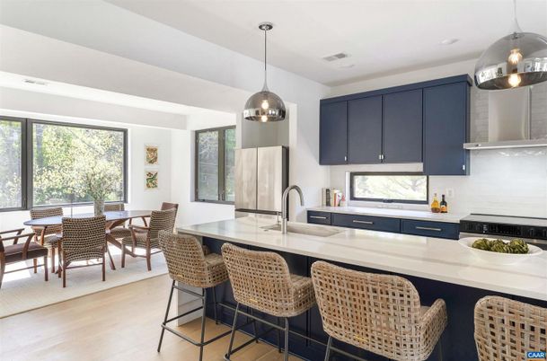 Dining room, Interior, Kitchen, Pendant Lights, Stainless Steel Appliances, Wood Texture Flooring