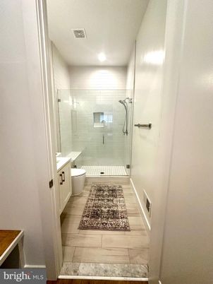 Bathroom, Free Standing Baths, Glass Shower, Interior, Recessed Lighting, Wood Texture Flooring