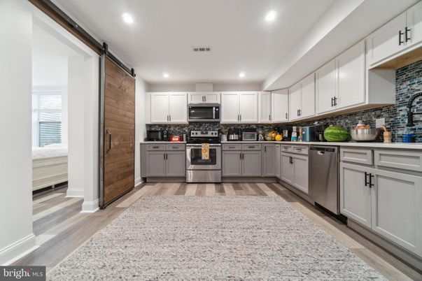 Interior, Kitchen, Recessed Lighting, Stainless Steel Appliances, Wood Texture Flooring
