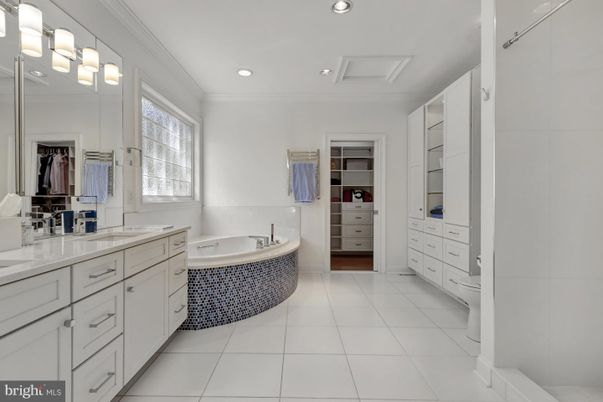 Bathroom, Dual Sink Vanities, Interior, Recessed Lighting, Walk-in Closets