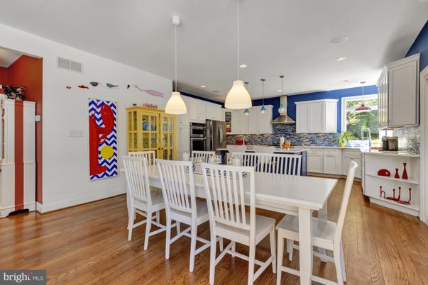Dining room, Interior, Kitchen, Pendant Lights, Recessed Lighting, Stainless Steel Appliances, Wood Texture Flooring