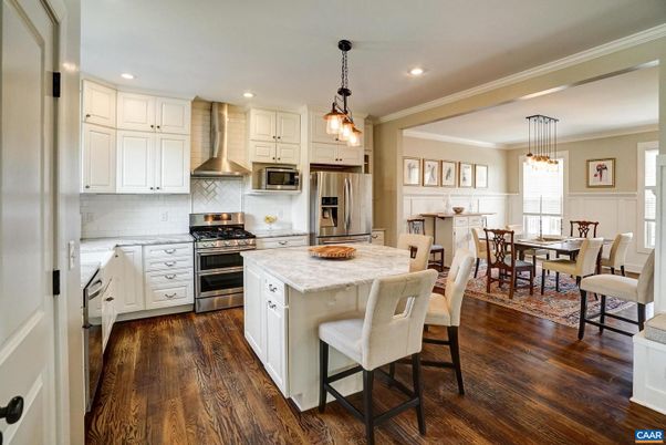 Dining room, Interior, Kitchen, Pendant Lights, Recessed Lighting, Stainless Steel Appliances, Wood Texture Flooring