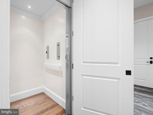 Elevator, Interior, Recessed Lighting, Wood Texture Flooring