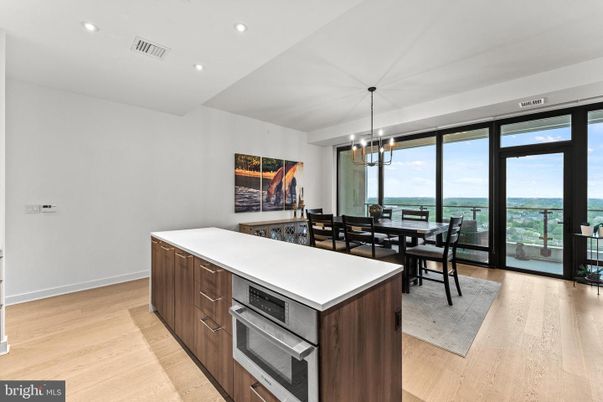 Chandelier, Dining room, Interior, Kitchen, Pendant Lights, Recessed Lighting, Water, Wood Texture Flooring