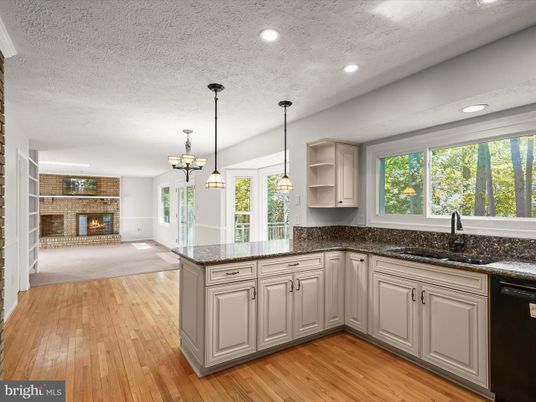 Empty room, Fireplace, Interior, Kitchen, Pendant Lights, Recessed Lighting, Wood Texture Flooring