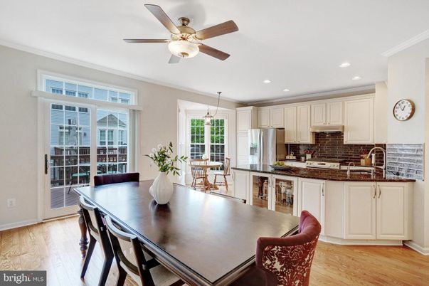 Dining room, Interior, Kitchen, Pendant Lights, Recessed Lighting, Stainless Steel Appliances, Wood Texture Flooring