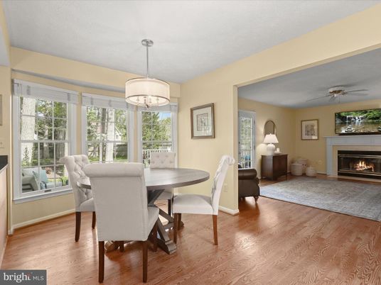 Dining room, Fireplace, Interior, Pendant Lights, Wood Texture Flooring