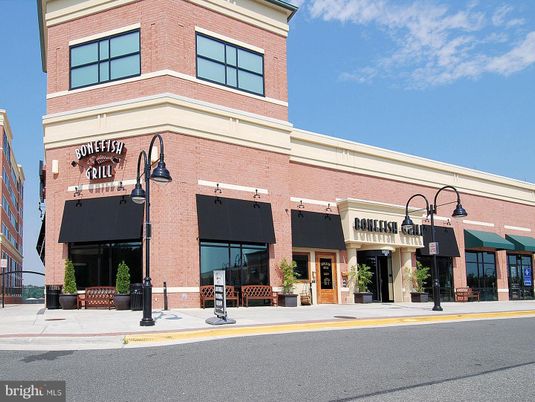 Exterior, Facade, Brick Facade, Condo Building