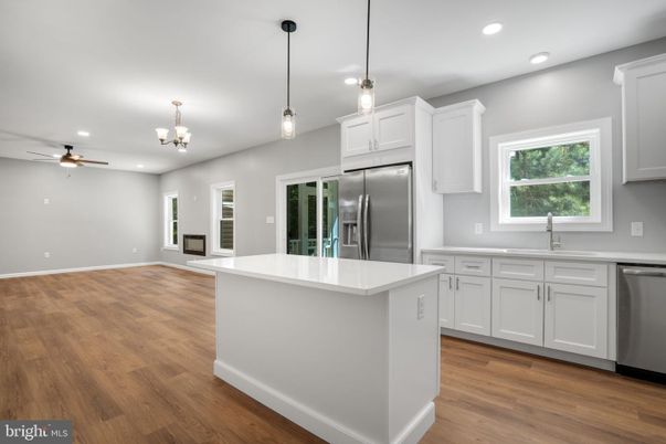 Chandelier, Interior, Kitchen, Pendant Lights, Recessed Lighting, Stainless Steel Appliances, Wood Texture Flooring