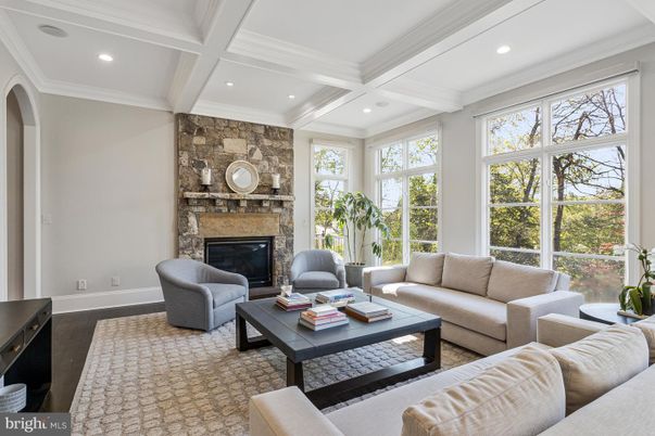 Fireplace, Interior, Living room, Recessed Lighting, Stone Walls, Wood Texture Flooring