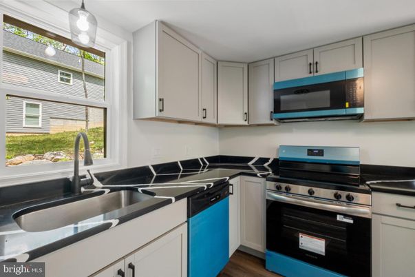 Interior, Kitchen, Pendant Lights, Stainless Steel Appliances, Wood Texture Flooring