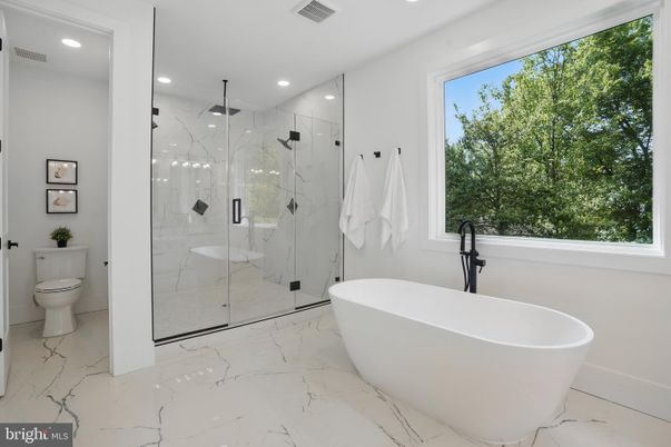Bathroom, Free Standing Baths, Glass Shower, Interior, Marble, Marble Walls, Recessed Lighting