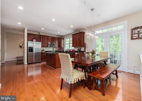 Chandelier, Dining room, Interior, Kitchen, Recessed Lighting, Stainless Steel Appliances, Wood Texture Flooring
