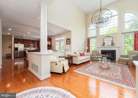 Fireplace, Interior, Kitchen, Living room, Pendant Lights, Recessed Lighting, Stainless Steel Appliances, Wood Texture Flooring