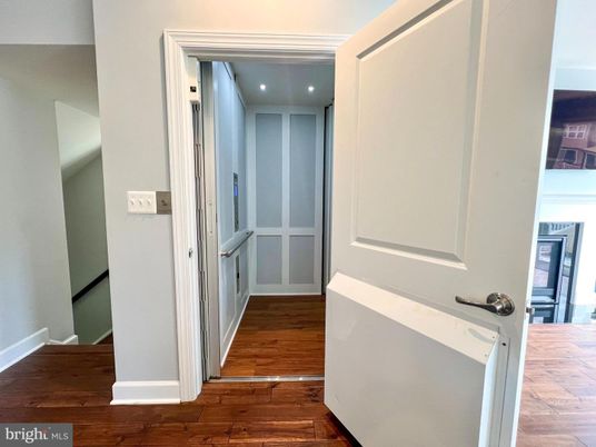 Elevator, Interior, Recessed Lighting, Wood Texture Flooring