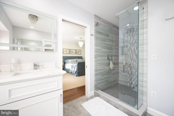 Bathroom, Bedroom, Glass Shower, Interior, Recessed Lighting, Wood Texture Flooring