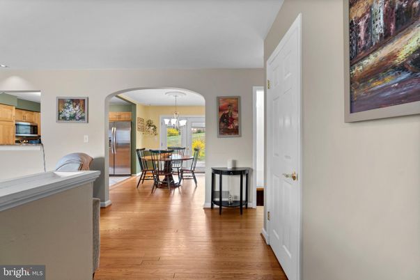 Chandelier, Dining room, Interior, Kitchen, Pendant Lights, Stainless Steel Appliances, Wood Texture Flooring