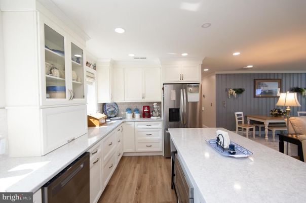 Dining room, Interior, Kitchen, Recessed Lighting, Stainless Steel Appliances, Wood Texture Flooring