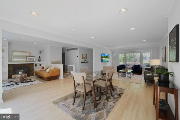 Dining room, Fireplace, Interior, Living room, Recessed Lighting, Wood Texture Flooring