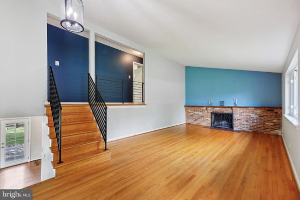 Empty room, Fireplace, Interior, Pendant Lights, Stone Walls, Wood Texture Flooring