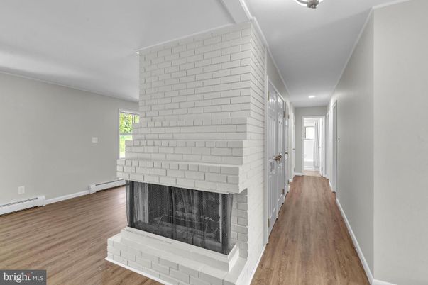 Fireplace, Interior, Recessed Lighting, Stone Walls, Wood Texture Flooring
