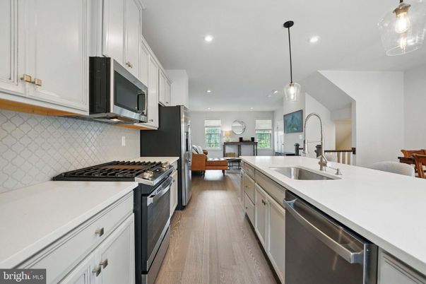 Dining room, Interior, Kitchen, Living room, Pendant Lights, Recessed Lighting, Stainless Steel Appliances, Wood Texture Flooring