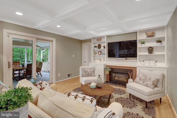 Dining room, Fireplace, Interior, Living room, Recessed Lighting, Wood Texture Flooring