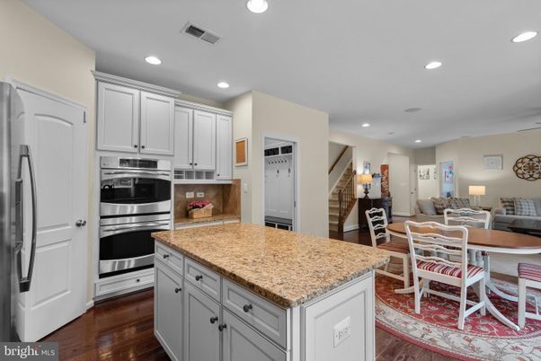 Dining room, Interior, Kitchen, Recessed Lighting, Stainless Steel Appliances, Wood Texture Flooring