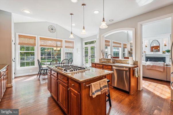 Dining room, Fireplace, Interior, Kitchen, Pendant Lights, Recessed Lighting, Wood Texture Flooring