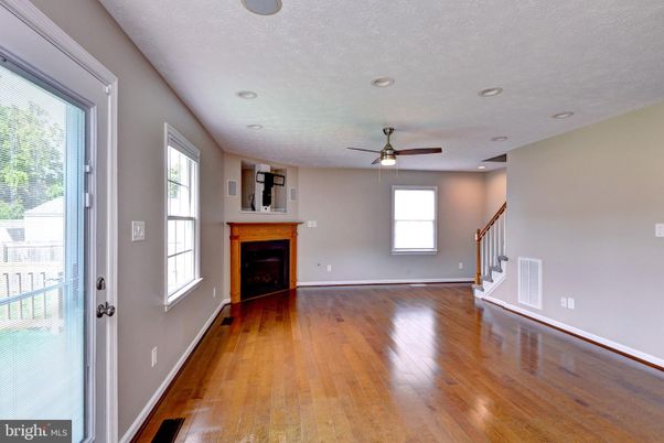 Empty room, Fireplace, Interior, Recessed Lighting, Wood Texture Flooring
