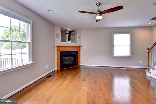 Empty room, Fireplace, Interior, Recessed Lighting, Wood Texture Flooring