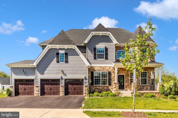 Attached, Exterior, Facade, Brick Traditional