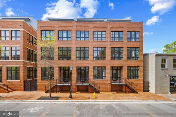 Exterior, Facade, Brick Facade, Condo Building
