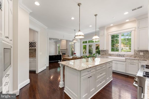 Fireplace, Interior, Kitchen, Pendant Lights, Recessed Lighting, Stainless Steel Appliances, Wood Texture Flooring