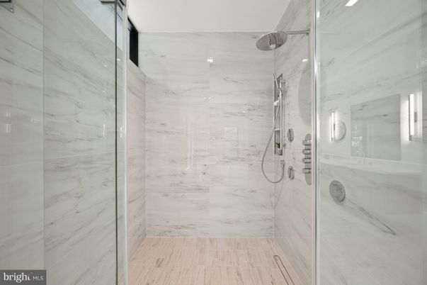 Bathroom, Glass Shower, Interior, Marble Walls, Wood Texture Flooring