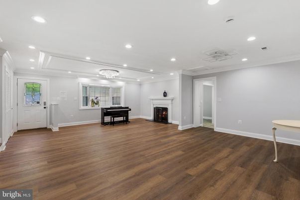 Fireplace, Interior, Piano, Recessed Lighting, Wood Texture Flooring