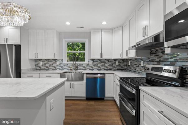 Chandelier, Interior, Kitchen, Recessed Lighting, Stainless Steel Appliances, Wood Texture Flooring