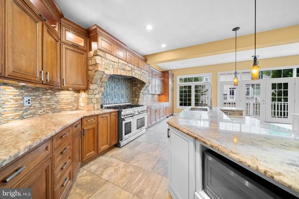Interior, Kitchen, Pendant Lights, Recessed Lighting, Stainless Steel Appliances, Stone Walls