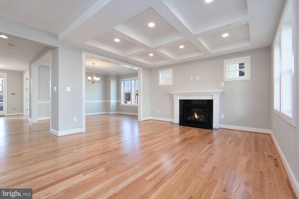 Chandelier, Empty room, Fireplace, Interior, Recessed Lighting, Wood Texture Flooring