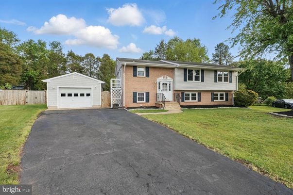 Attached, Detached Garage, Exterior, Facade, Brick Facade, Raised Ranch